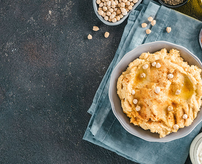 A bowl of hummus with chickpeas