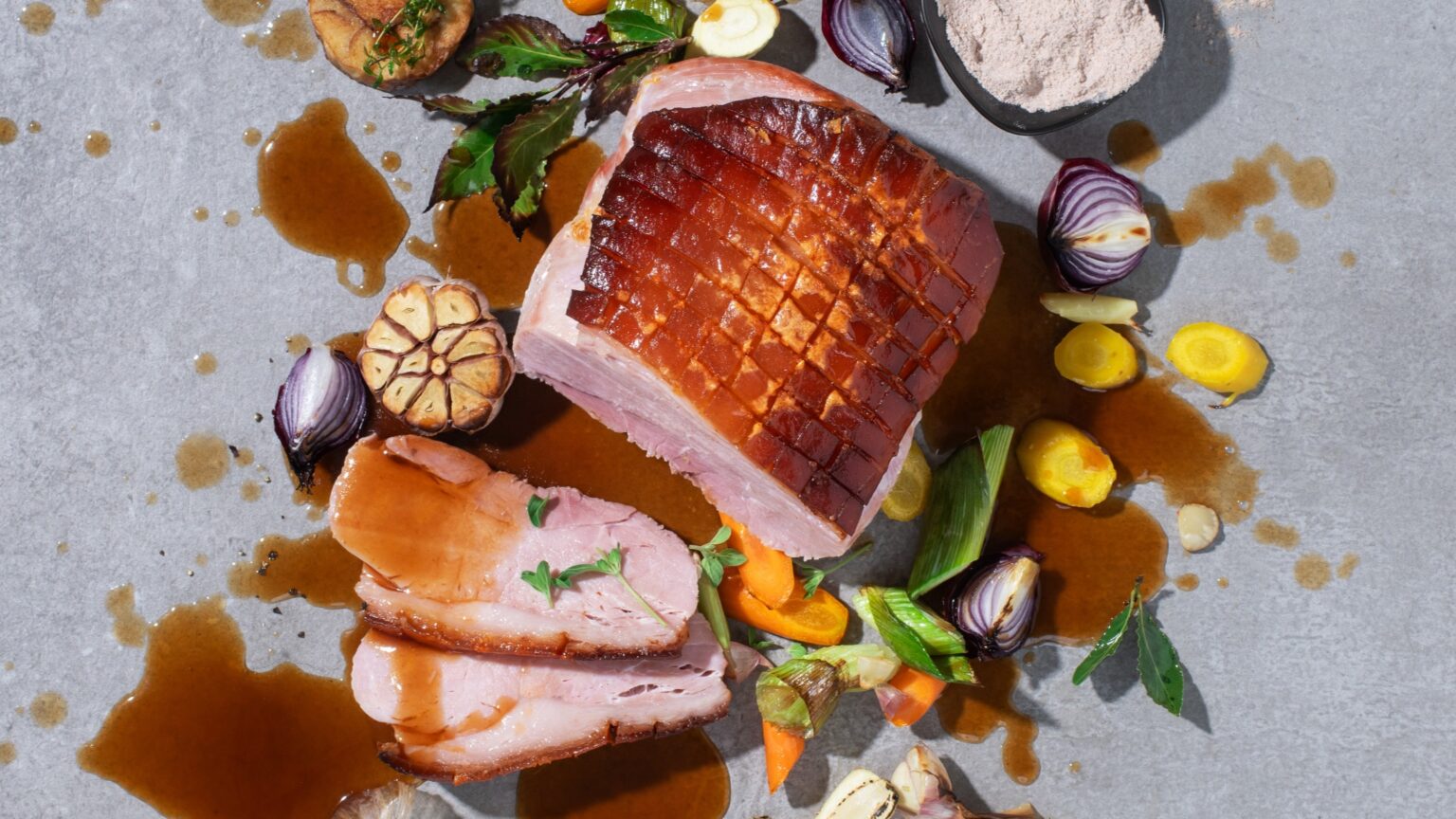Sliced roast meat with sauce and vegetables