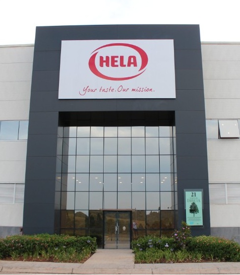 Entrance of a HELA building with the HELA logo