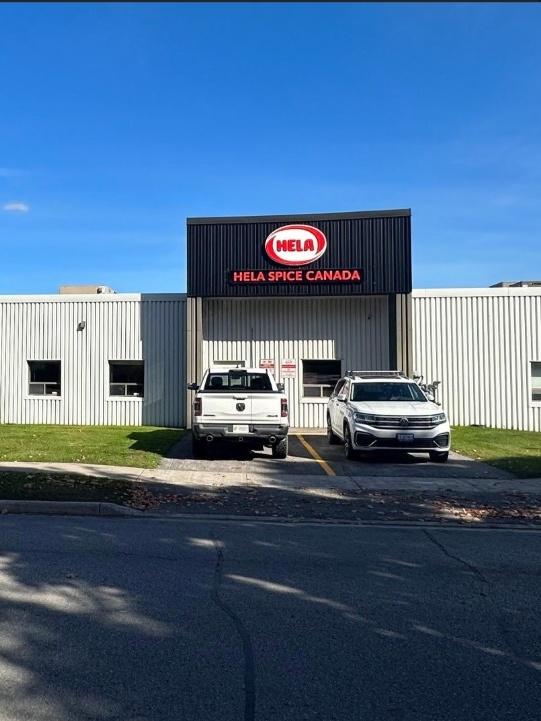 HELA Spice Canada building with parked cars
