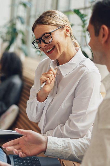Smiling colleagues in a discussion